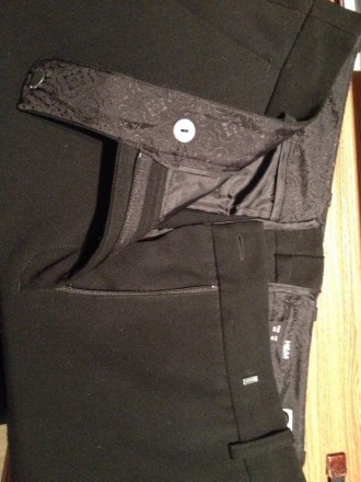 Длинные чёрные брюки H&M
Новые. Не мнутся. Ткань немного тянется.
длина от поя. . фото 9