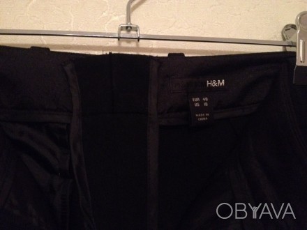 Длинные чёрные брюки H&M
Новые. Не мнутся. Ткань немного тянется.
длина от поя. . фото 1