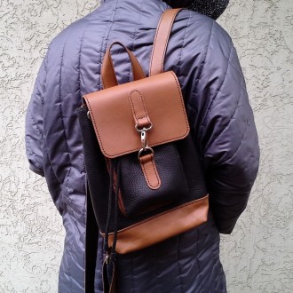 Кожаный городской рюкзак выполнен из натуральной кожи двух цветов : черной и кор. . фото 3