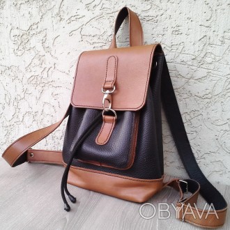 Кожаный городской рюкзак выполнен из натуральной кожи двух цветов : черной и кор. . фото 1