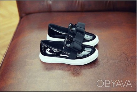 Цвет: черный

Легкие и удобные лаковые туфли.. . фото 1