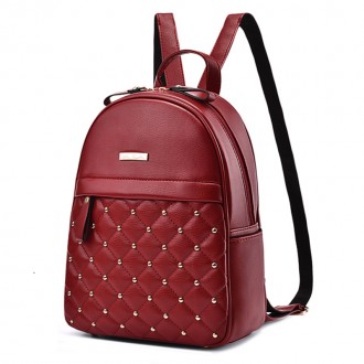 Изысканный стеганый кожаный рюкзак с заклепками для стильных и элегантных модниц. . фото 2