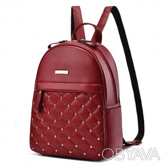 Изысканный стеганый кожаный рюкзак с заклепками для стильных и элегантных модниц. . фото 1