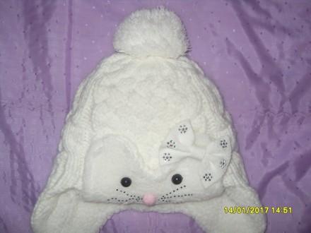 Продам дитячу зимову шапочку (для дівчинки 2-5 р.) в ідеальному стані. На фото н. . фото 3