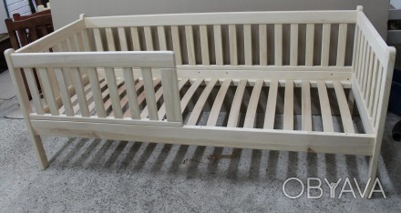Кровать детская с бортиками, изготовлена из натурального дерева. От производител. . фото 1