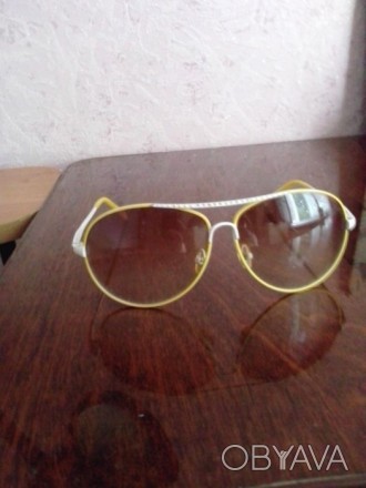 Продам солнцезащитные очки для девочки,, стекла светлые, состояние отличное.. . фото 1