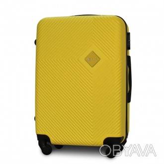 
Предлагаем к покупке среднего размера пластиковый чемодан Fly 2130 польского пр. . фото 1