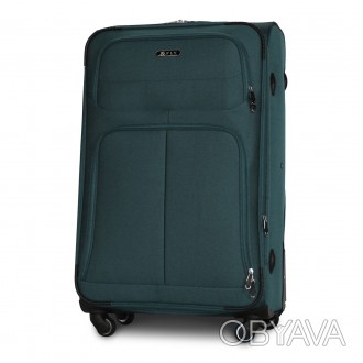 
Предлагаем к приобретению большой тканевый чемодан польского производителя Fly . . фото 1
