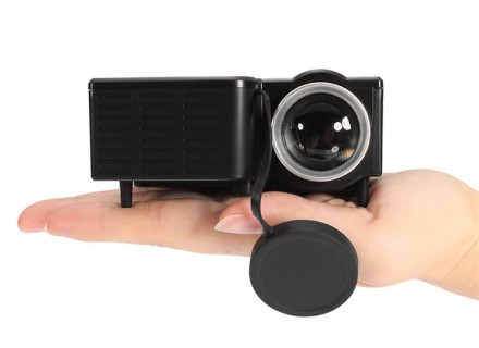 Этот мини-светодиодный пико проектор удобно носить с собой, он очень легкий и им. . фото 2