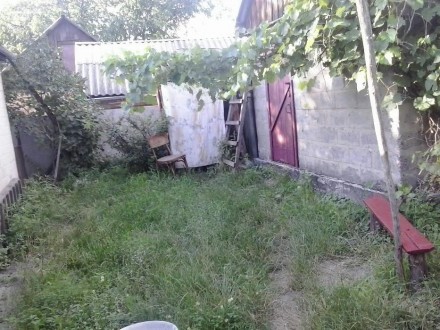 Продам дом на ул.Ткаченко, р-н Загребля,кирп.,на 2 входа, отопление печное и газ. . фото 5