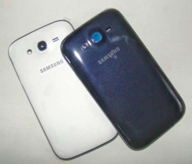 Абсолютно новые корпуса Galaxy Grand.

Samsung Galaxy Grand (i9082) синего и б. . фото 4