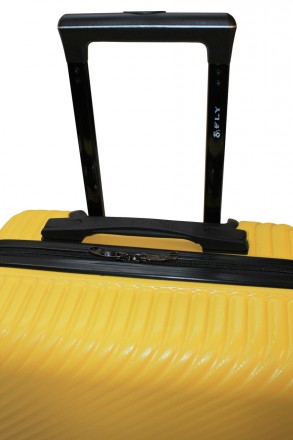 
Предлагаем к покупке среднего размера пластиковый чемодан Fly 2702 польского пр. . фото 9