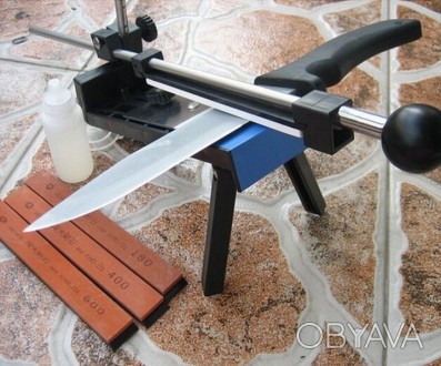 Известная модель мини станка для супер заточки ножей Lansky . Данный способ зато. . фото 1