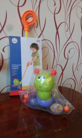 Музыкальная детская каталка Huile Toys «Гусеница» - это яркая и интересная игруш. . фото 3