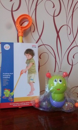 Музыкальная детская каталка Huile Toys «Гусеница» - это яркая и интересная игруш. . фото 2