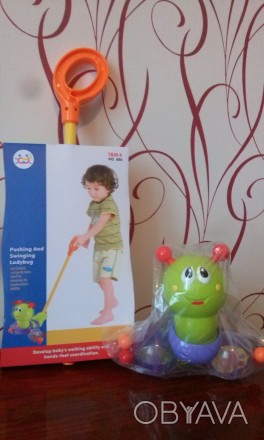 Музыкальная детская каталка Huile Toys «Гусеница» - это яркая и интересная игруш. . фото 1
