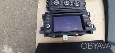 Продается Магнитола навигация GJS166DV0C на Mazda 3 в б/у состоянии. Фото соотве. . фото 1