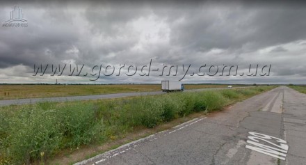 Продам земельный участок 1 Га по трассе Днепр-Харьков. Расположен длиной (около . . фото 3