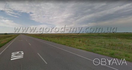 Продам земельный участок 1 Га по трассе Днепр-Харьков. Расположен длиной (около . . фото 1
