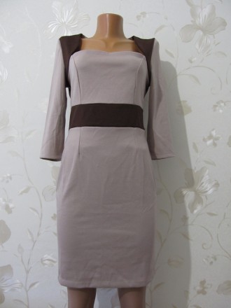 Продам новое трикотажное платье размер 42- 44 (S)
Цвет бежевый с коричневыми вс. . фото 3