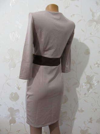 Продам новое трикотажное платье размер 42- 44 (S)
Цвет бежевый с коричневыми вс. . фото 4