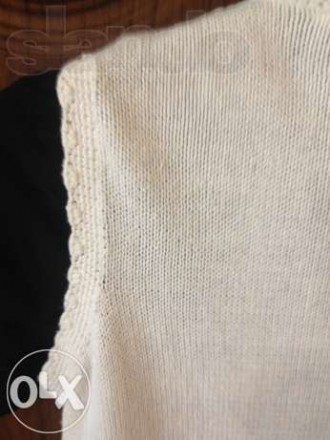 продам новую (одета один раз) вязаную фирменную белую жилетку с красивым узором . . фото 3
