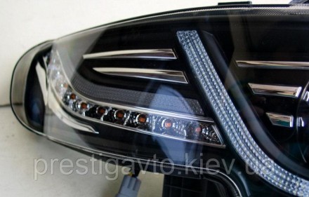 Комплект обвеса - передняя,задняя оптика и решетка радиатора на Toyota FJ Cruise. . фото 4