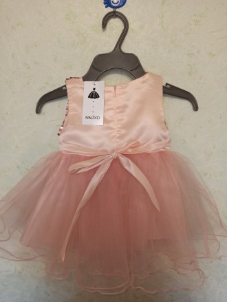 Нарядное нежно-персековое платье с розой для девочки
Цена 300 грн
Код товара 3. . фото 7