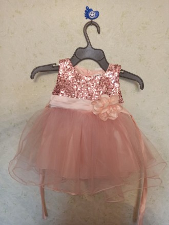 Нарядное нежно-персековое платье с розой для девочки
Цена 300 грн
Код товара 3. . фото 9
