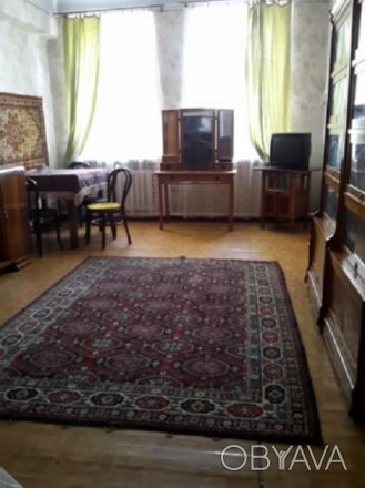 Продам 2-комнатную сталинку в кирпичном доме с ж/б перекрытиями на ул. Коминтерн. . фото 1
