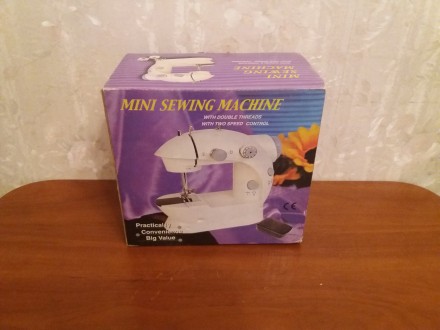 Продам портативную швейную машинку портативная Mini Sewing Machine SM-202A.

M. . фото 9