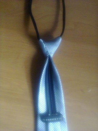 Детский галстук серого цвета с черными полосками в хорошем состоянии фирмы G-FAR. . фото 7