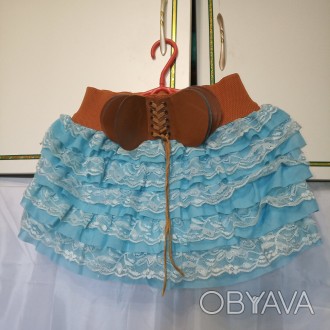 Короткая женская летняя юбка в рюш. 
Нежно голубого цвета с коричневым поясом р. . фото 1