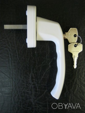 Ручка с замком-кнопкой и ключом от отечественного производителя ("анти - детка"). . фото 1
