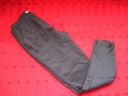Фирменные женские штаны в отличном состоянии.Цвет-коричневый.Состав ткани:68%пол. . фото 4