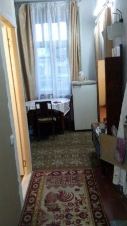Продам 1 к. квартиру (большой коридор, кухня-гостинная, спальня, санузел), общая. . фото 4