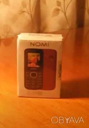 Продпм новый мобильный телефон на 2 сим-карты  Nomi i188.
Цвет красный. Полный . . фото 1
