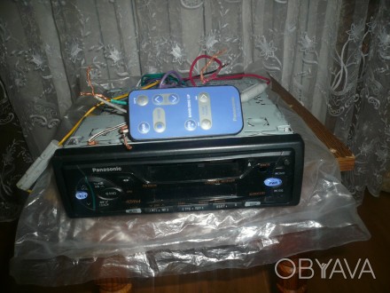 Магнитола автомобильная  с Приемником и маг для компакт кассет  с  пультом управ. . фото 1