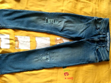 Новые джинсы без бирки на мальчика 10-11 лет с имитацией потёртостей.Куплены в H. . фото 2