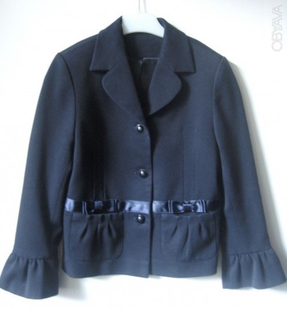 Пиджак  для девочки первоклашки темно-синего цвета.

Очень красивый элегантног. . фото 1