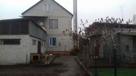 Продам новый 2-х этажный дом с.Омельченки Змиевской район 112 кв.м. на первом эт. . фото 2