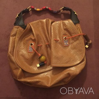 Шикарная козырная кожаная сумка от Louis Vuitton ,небольшая и удобная,очень вмес. . фото 1