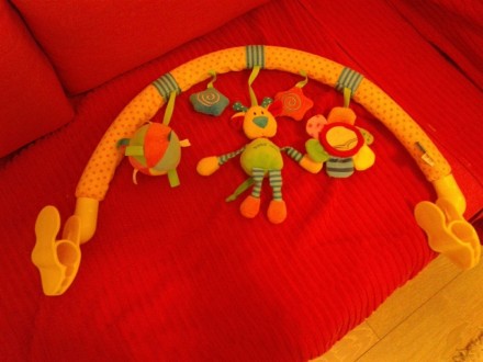 Развивающая дуга на коляску. Все игрушки будут интересны малышу, жирафик растяги. . фото 6