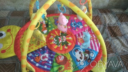Продам новый розвивающий коврик-черепашку с подвесными мягкими игрушками-погрему. . фото 1
