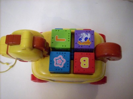 Игрушка-каталка «Обучающий пони». Вставляя и вынимая кубики, малыш выучит назван. . фото 3