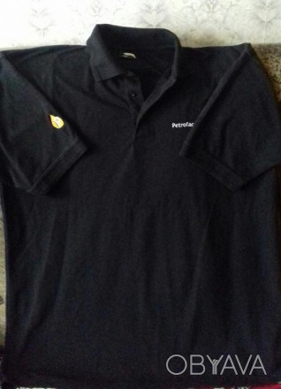Стильная мужская футболка-поло черного цвета с короткой застежкой с стояче-отлож. . фото 1