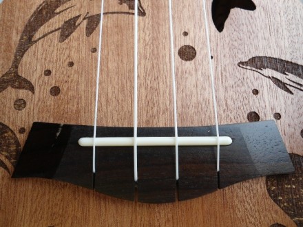 Укуле́ле — гавайский четырёхструнный щипковый музыкальный инструмент. Настраивае. . фото 6
