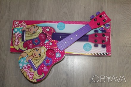 Первая гитара Барби спроектирована для маленьких звезд и начинающих музыкантов. . . фото 1