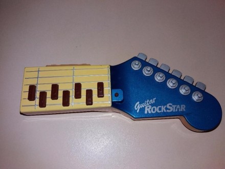 Продам интерактивную гитару от Tomy RockStar. Оригинал. Состояние на фото. Детск. . фото 2
