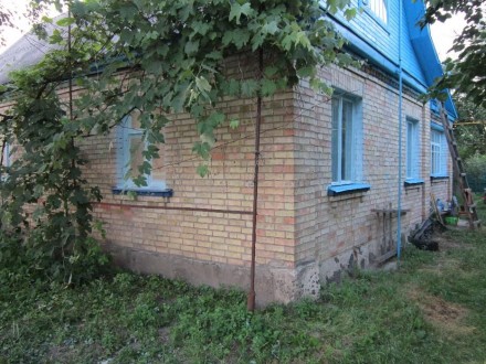 Приватизированный дом в Бородянке, 29 соток, гараж 45 квадратных метров, летняя . Бородянка. фото 5